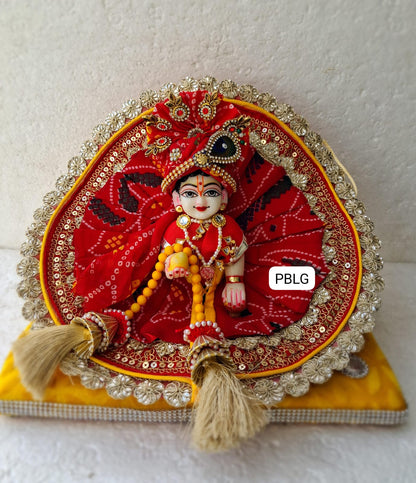 Red bandhini dress with pagdi and patka