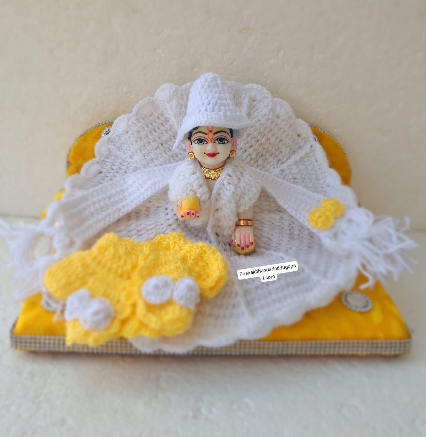 White dress with yellow jacket and muffler